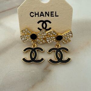 Elegant Gold and Black Bow Earrings